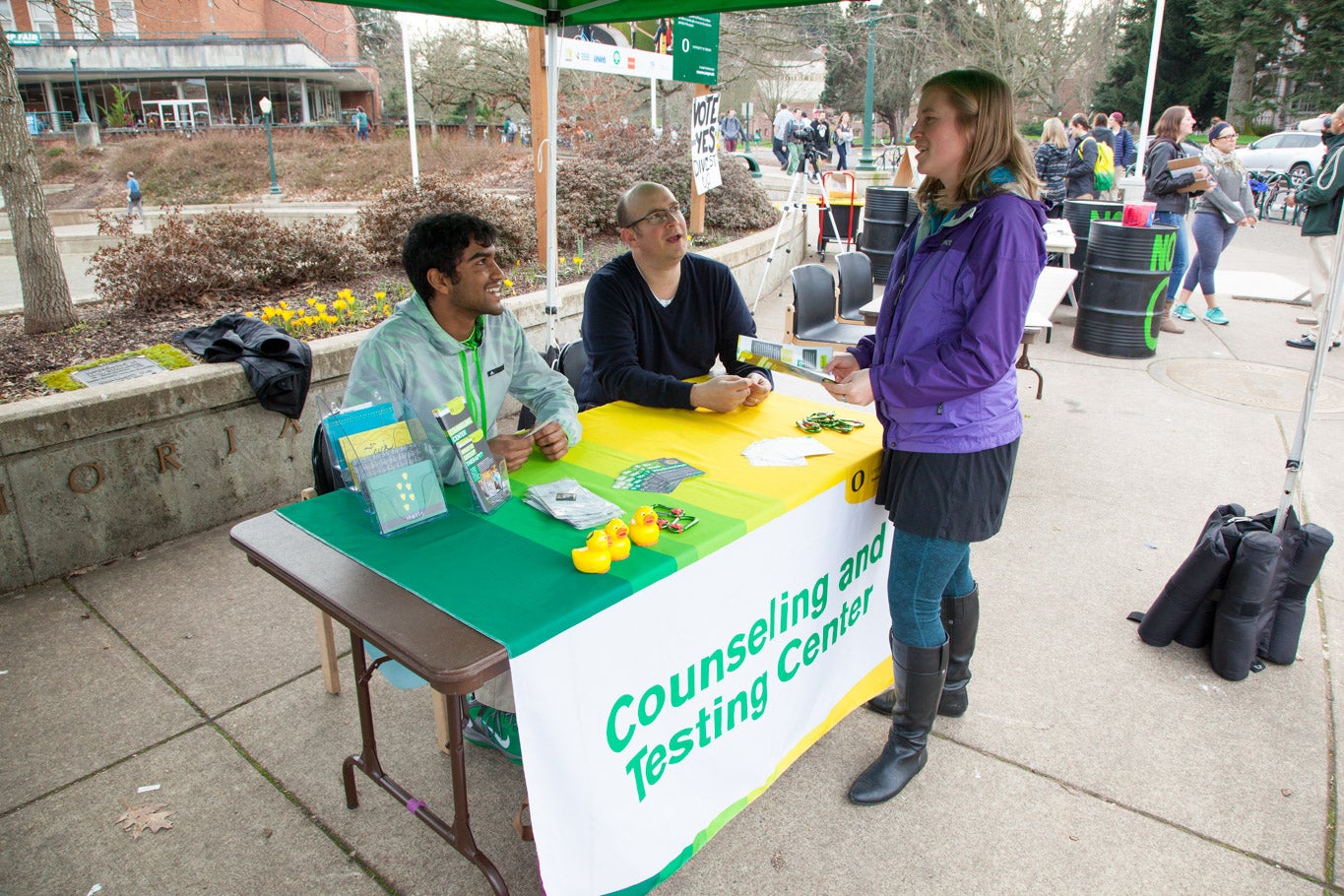 Counseling center staff table in front of the Erb Memorial Union