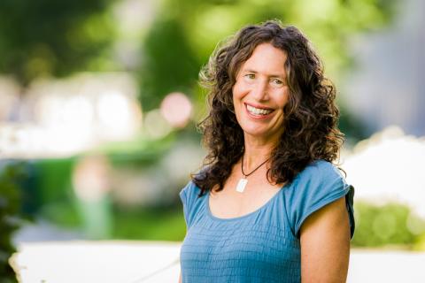 Kimberly Wasserman wearing a blue blouse